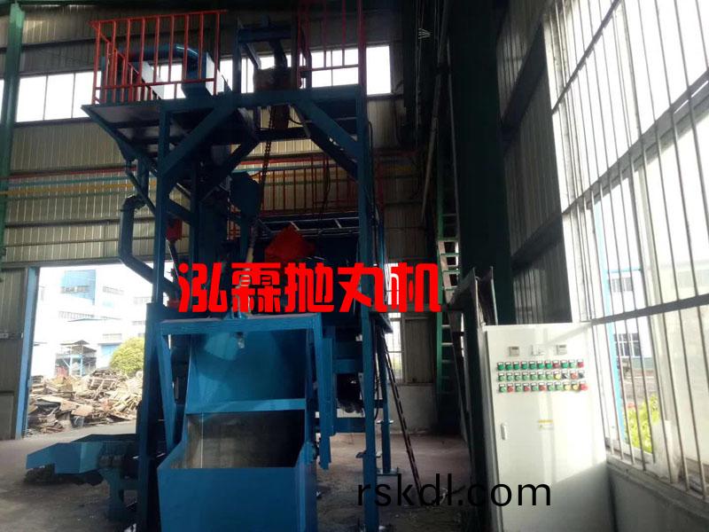 Q3210自(zi)動上下(xia)料履(lv)帶(dai)式(shi)抛丸機(ji)